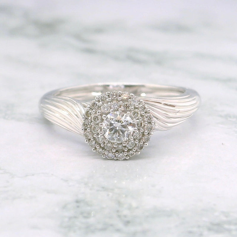 Round Shape Swirled Diamond Ring